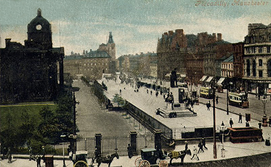 An old postcard showing the Esplanade in Piccadilly with statues.  Next to the Esplanade is the Manchester Infirmary.