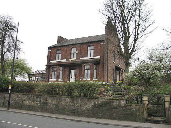 Houses on
                      the railway embankment near Slade Lane